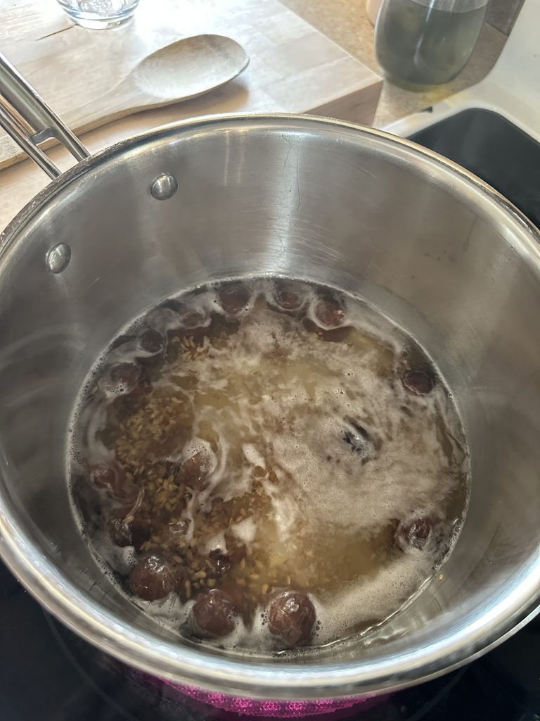 Homemade Soap Nuts cooking in pot on stove