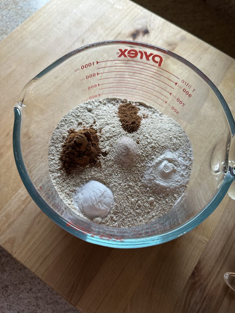 whole wheat flour ground up with seasonings in bowl